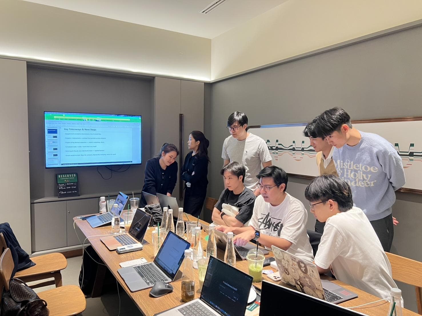 GEM Energy employees working together during the Claude Business adoption program